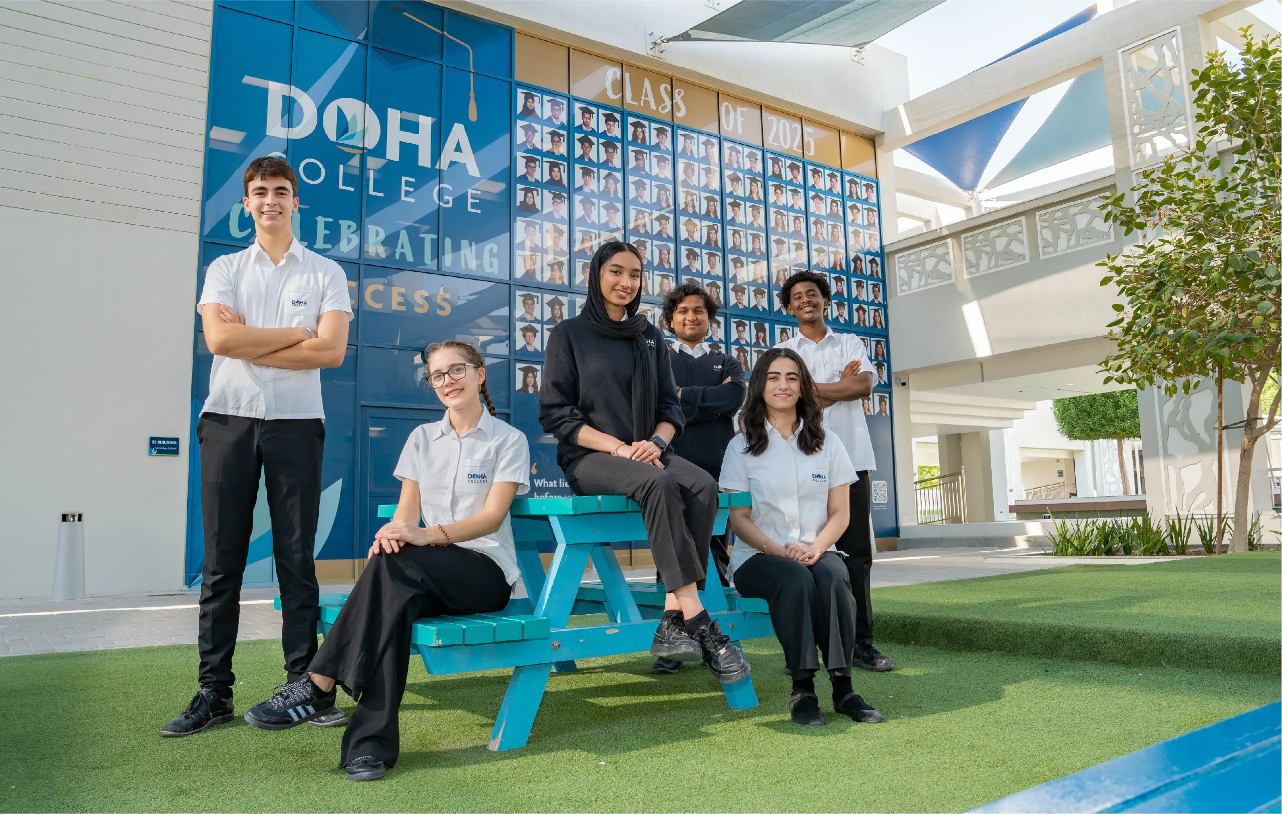 Doha College Students Wearing House Shirts