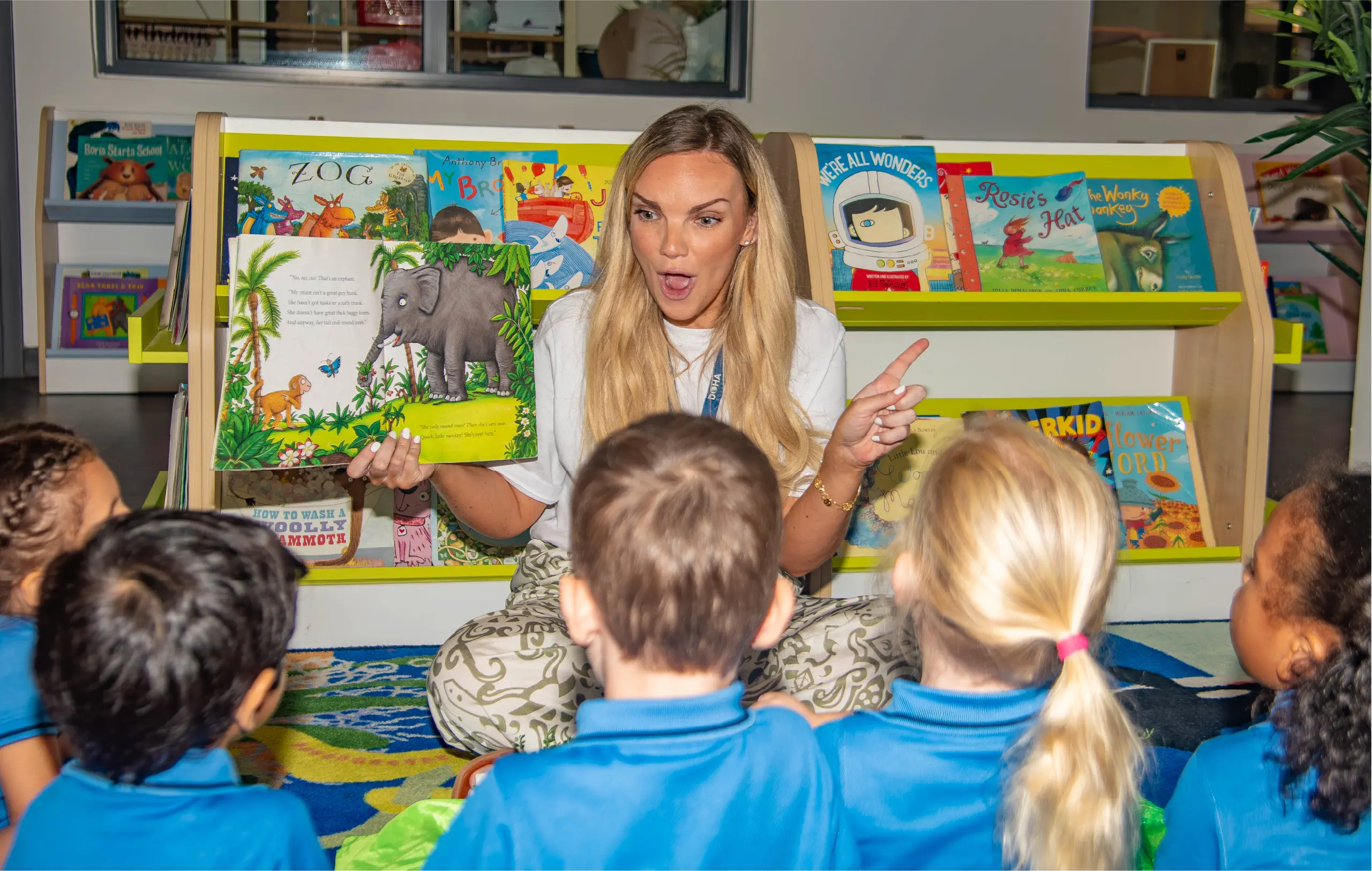 Teacher Helping Student Write