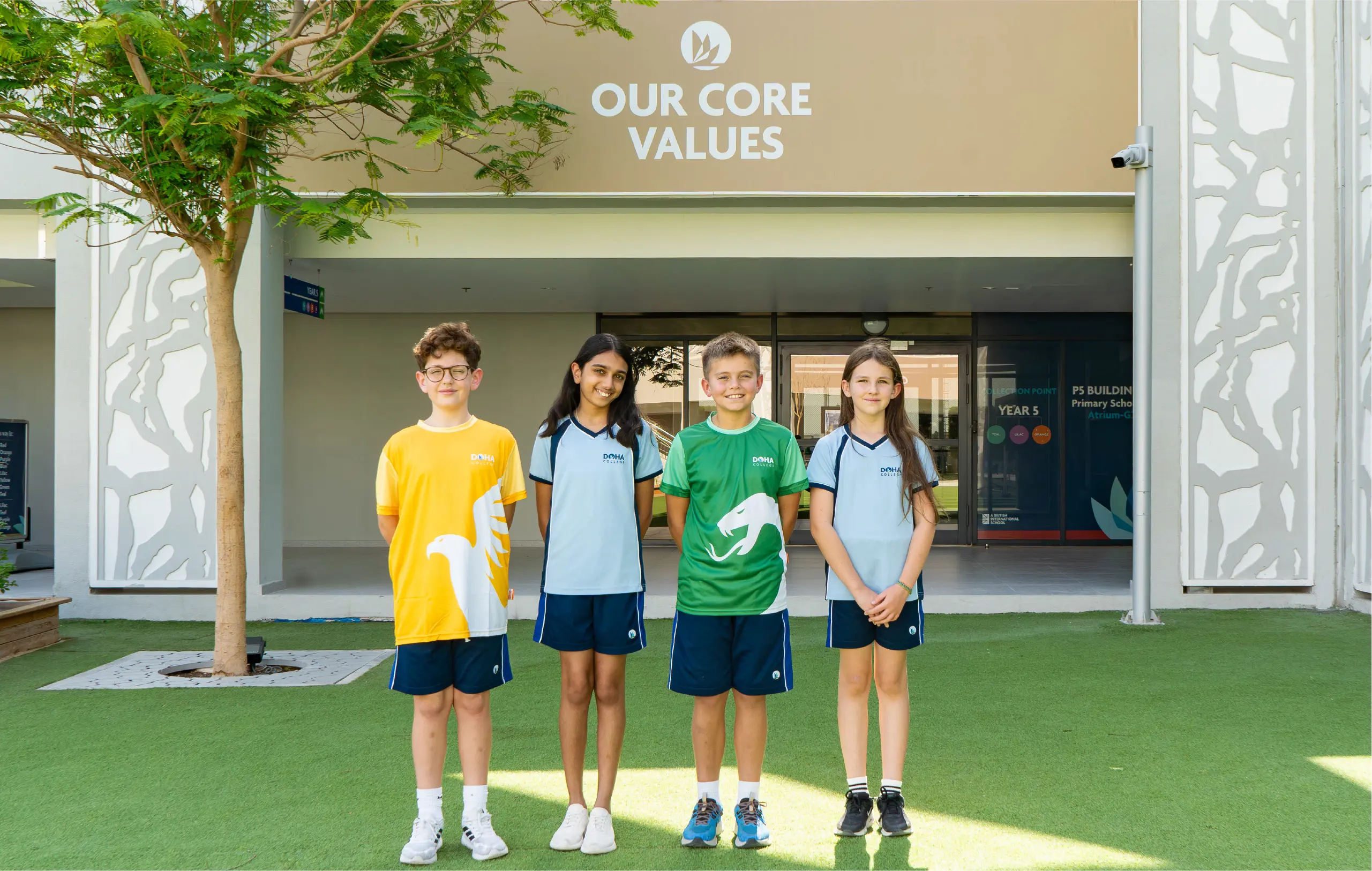 Doha College Students Wearing House Shirts