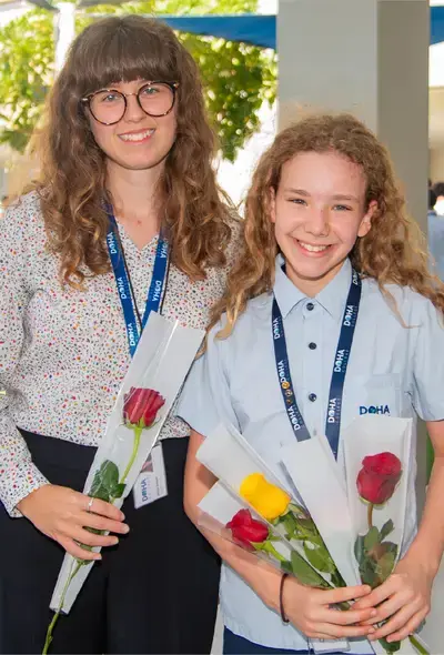 Teacher Posing with Student for Award Ceremony