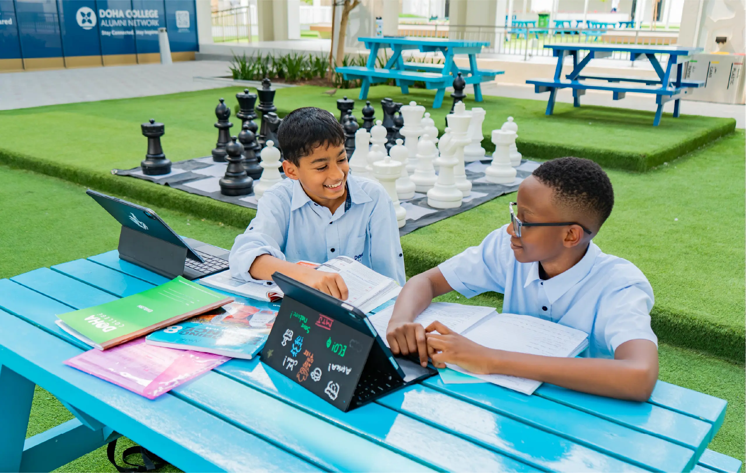 Students Doing School Work in Outdoor Courtyard